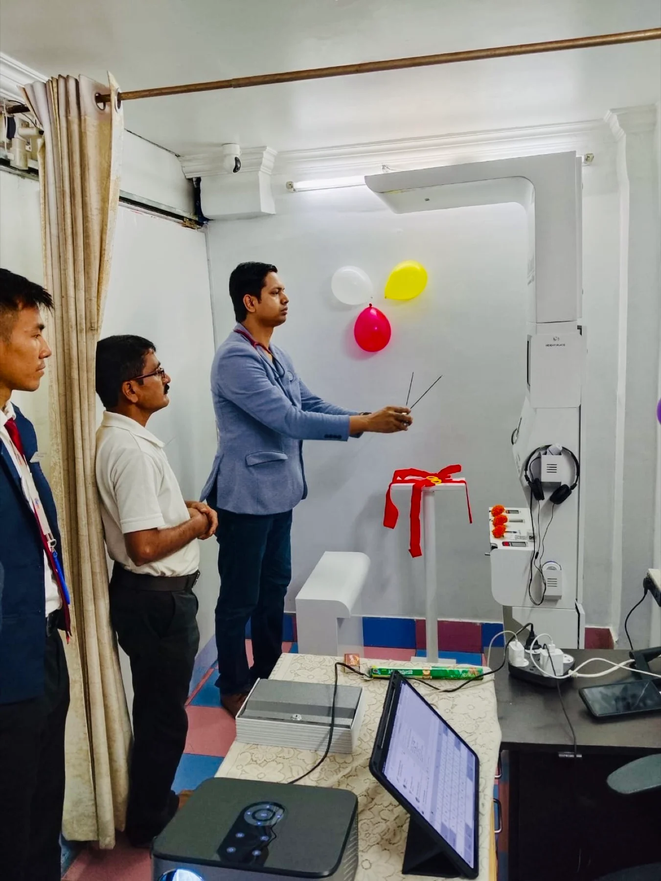 Ribbon-cutting inauguration of a health kiosk installation, part of Clinics On Cloud's presence in West Bengal