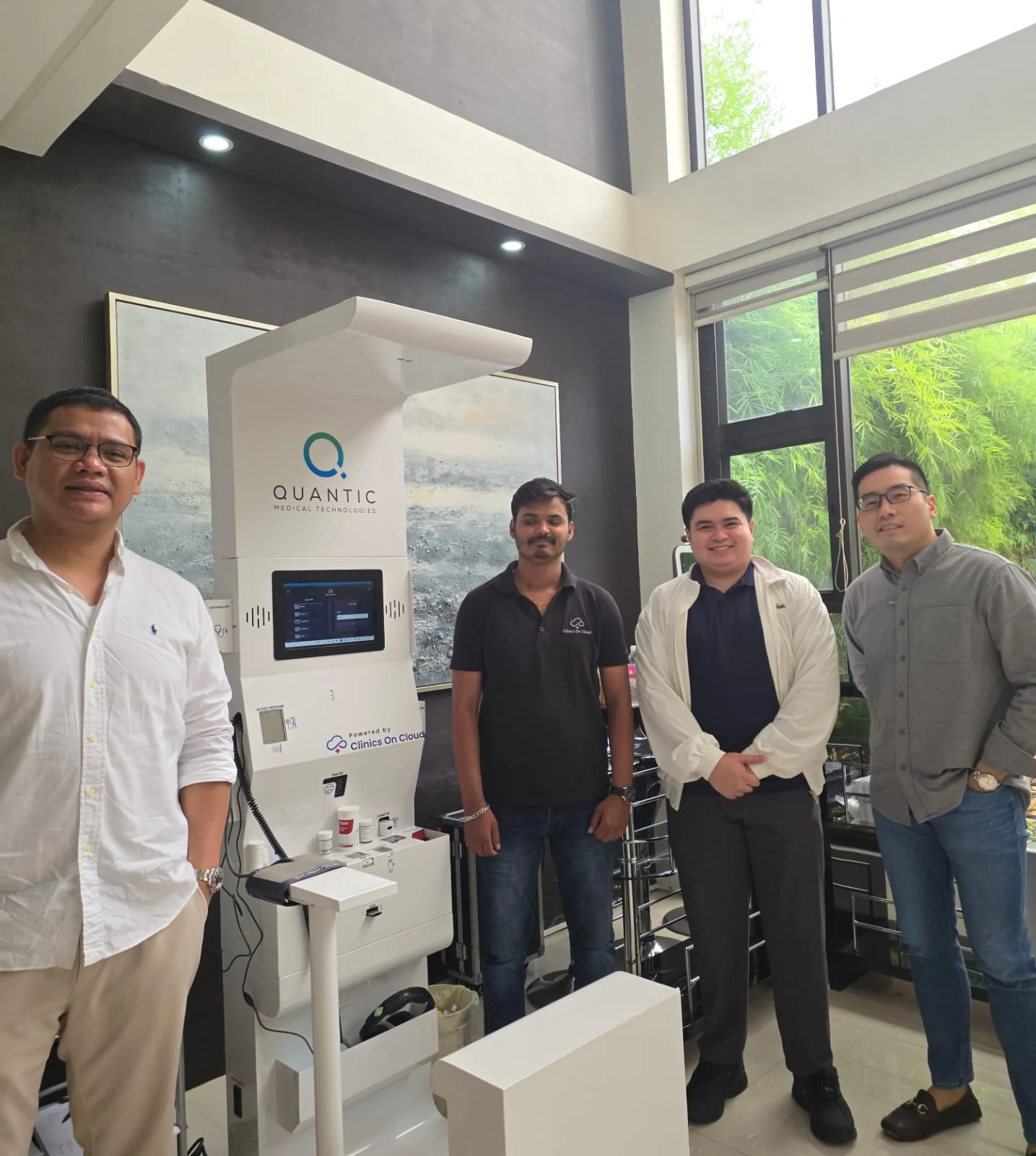 Clinics On Cloud health kiosk presence in the Philippines, with team and partners at a client site