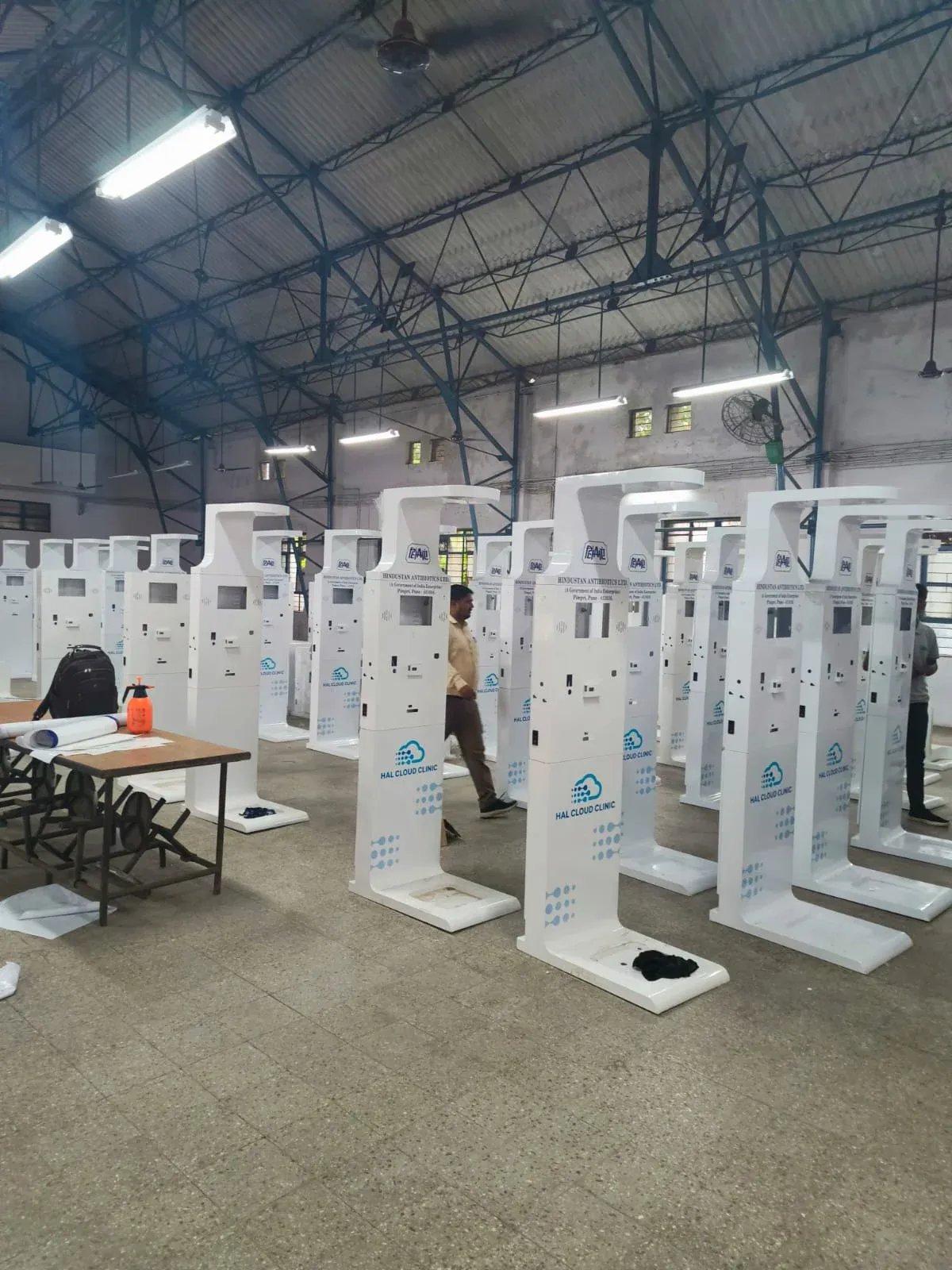 Rows of health kiosks in production after the assembly line was expanded