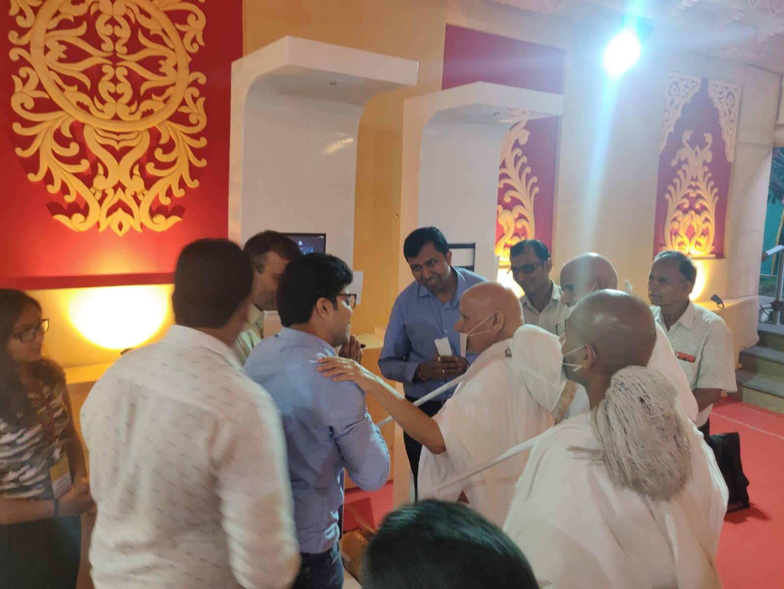 Visitors being screened at an early Clinics On Cloud health camp in a community hall
