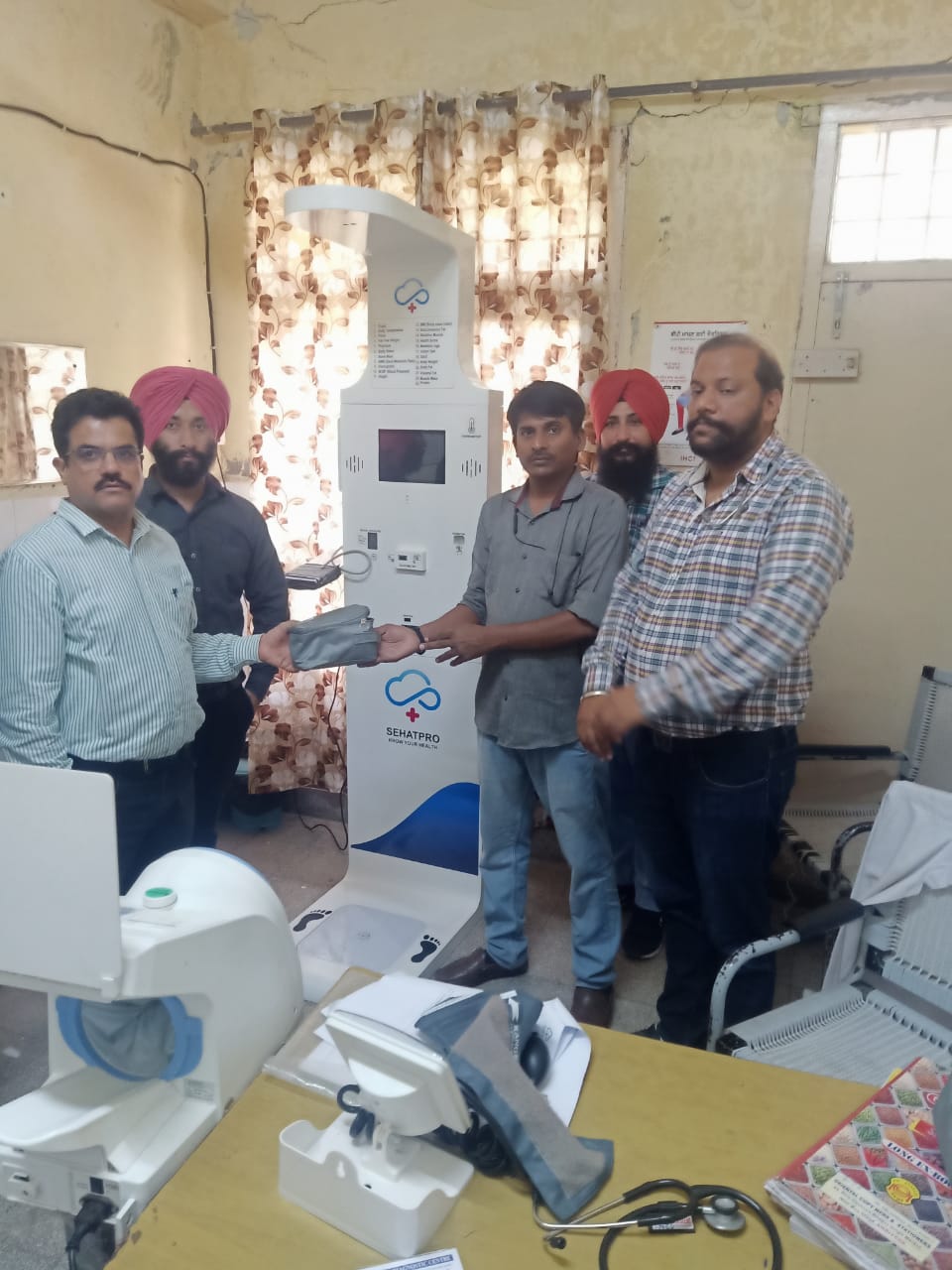 SehatPro health kiosk handover at a Punjab facility under Clinics On Cloud's Our Presence programme