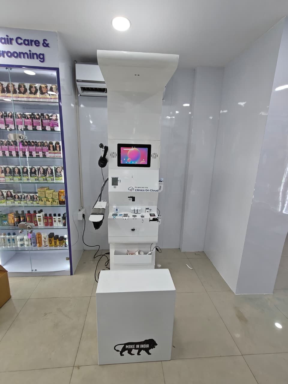 Clinics On Cloud health kiosk deployed in a retail pharmacy setting in Uttar Pradesh