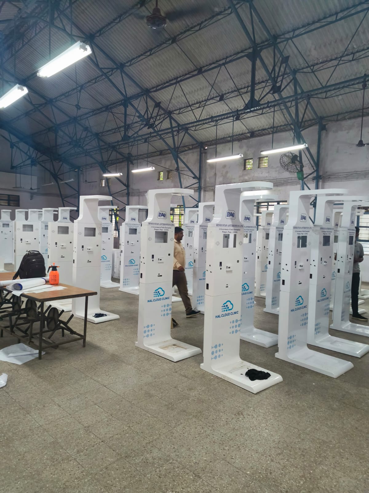 Rows of health kiosks in production after the assembly line was expanded