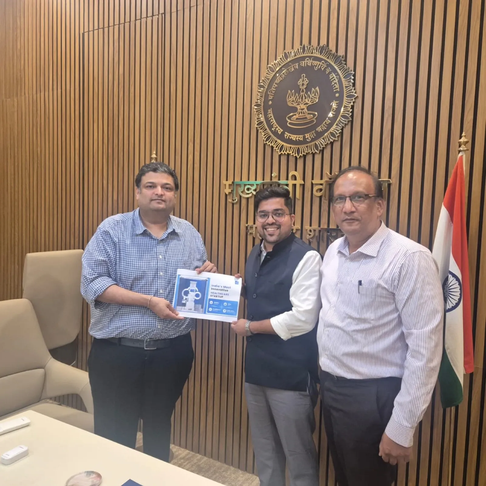 Clinics On Cloud presenting the Health ATM at a government office in Maharashtra