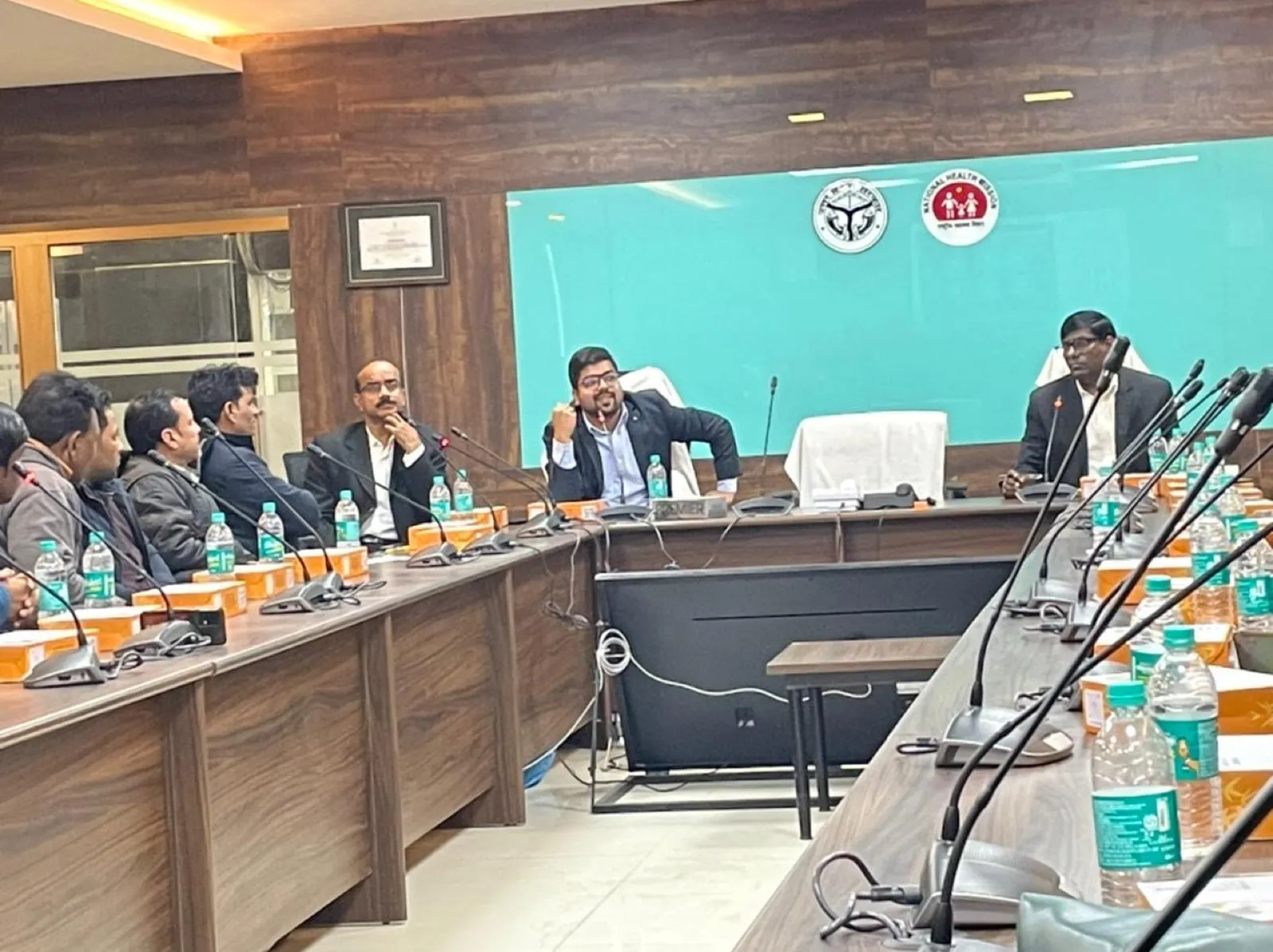 Clinics On Cloud presenting the Health ATM to state health officials in a government boardroom